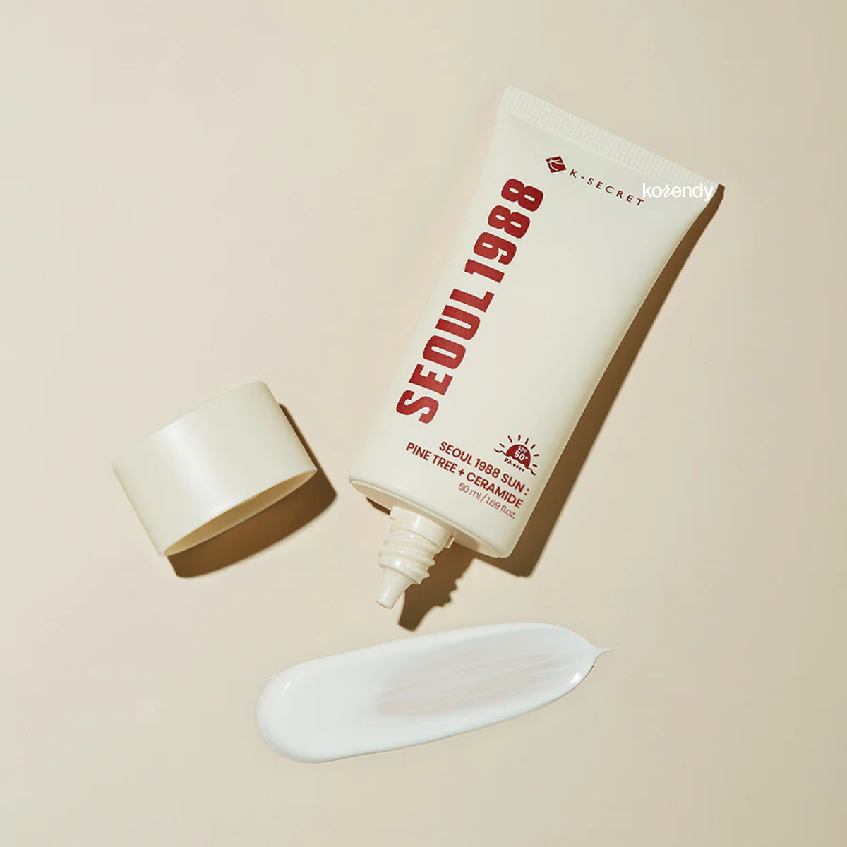 K-Secret - SEOUL 1988 Sun Pine Tree + Ceramide (Çam Özlü ve Seramidli, Koruyucu Bariyer Bakımı Sunan, Anti-Aging Destekli Güneş Kremi SPF 50+ PA++++) 50ml